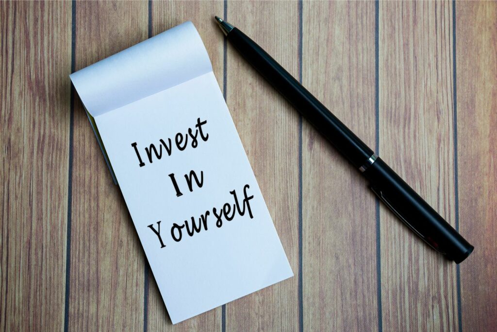 Taccuino con frase motivazionale: Invest in Yourself